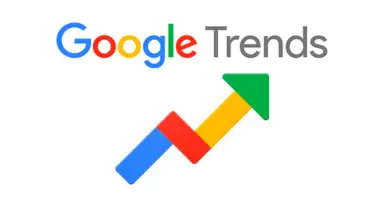 Un logo colorato di Google Trends con una freccia rivolta verso l'alto, che rappresenta crescita e tendenze