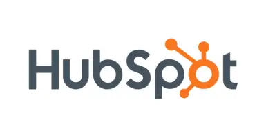 Un grande logo arancione e grigio per l'azienda HubSpot, una piattaforma software di marketing e vendita
